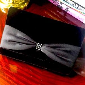Nordstrom’s black, velvet, bow evening bag